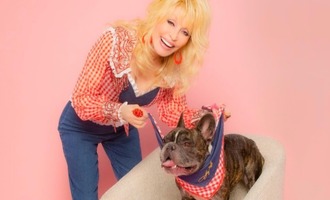 Dolly Parton launches perfectly named dog accessories brand “Doggy Parton”