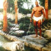 Mike Tyson poses with his tiger