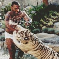 Mike Tyson wrestles his tiger