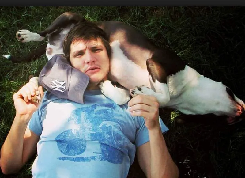 Pedro Pascal cuddling with his late rescue dog Gretta