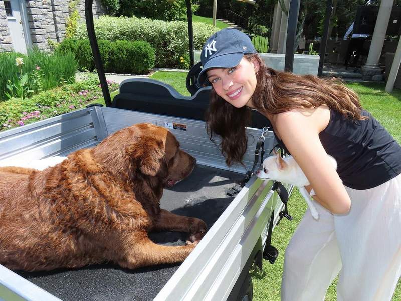 Nicola Peltz with her childhood dog Bear