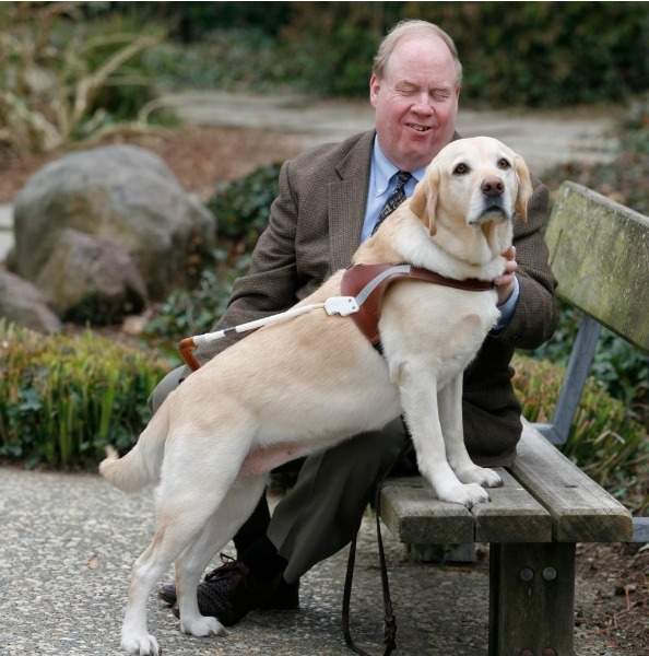 Guide dog Roselle and owner Michael Hingson