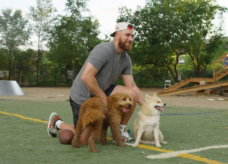 Travis Kelce with his dogs