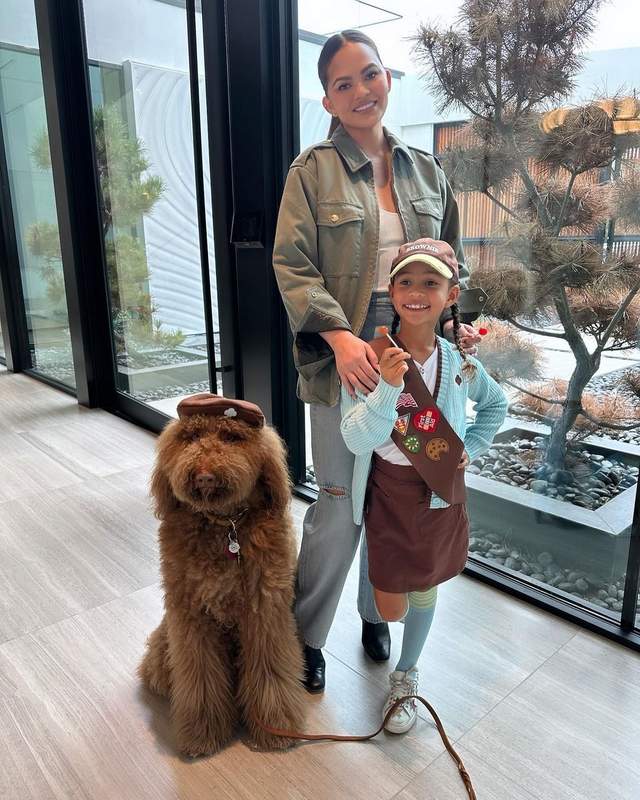 Chrissy Teigen with daughter Luna and poodle Petey