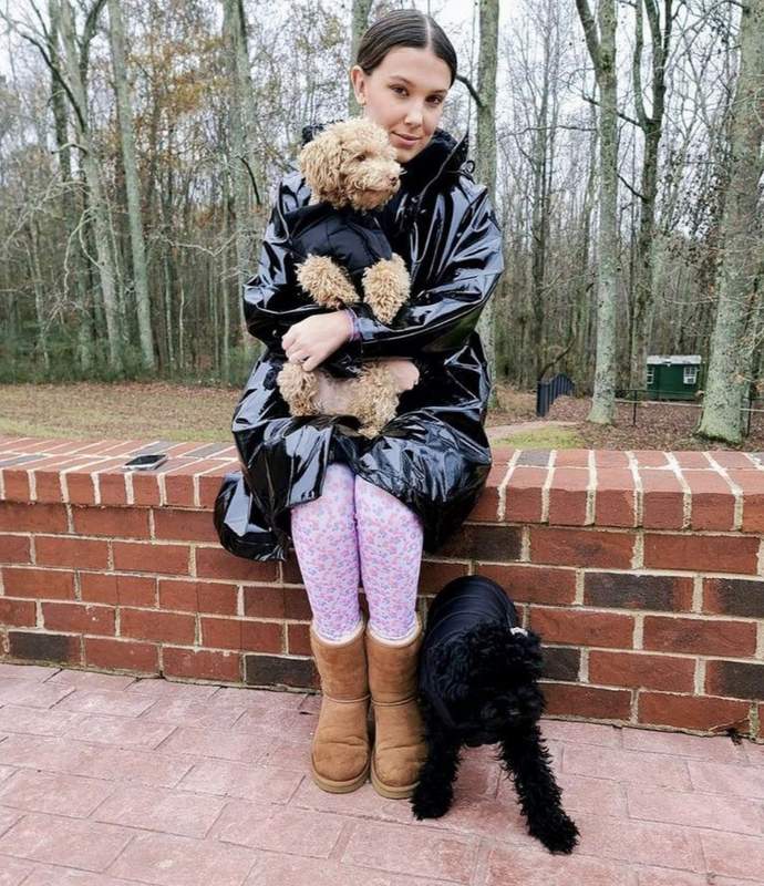 Millie Bobby Brown with dogs Winnie and Luna