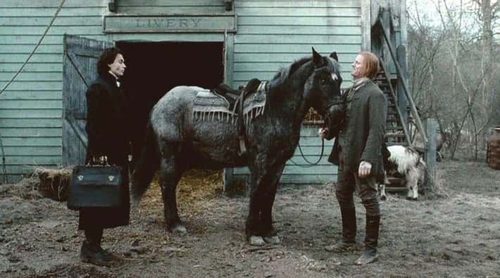 Johnny Depp with horse on Sleepy Hollow movie set
